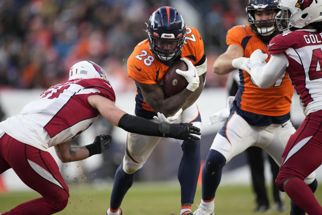 Denver Broncos running back Latavius Murray (28) walks on the sidelines  before the second half of an NFL football game against the Tennessee Titans  Sunday, Nov. 13, 2022, in Nashville, Tenn. (AP