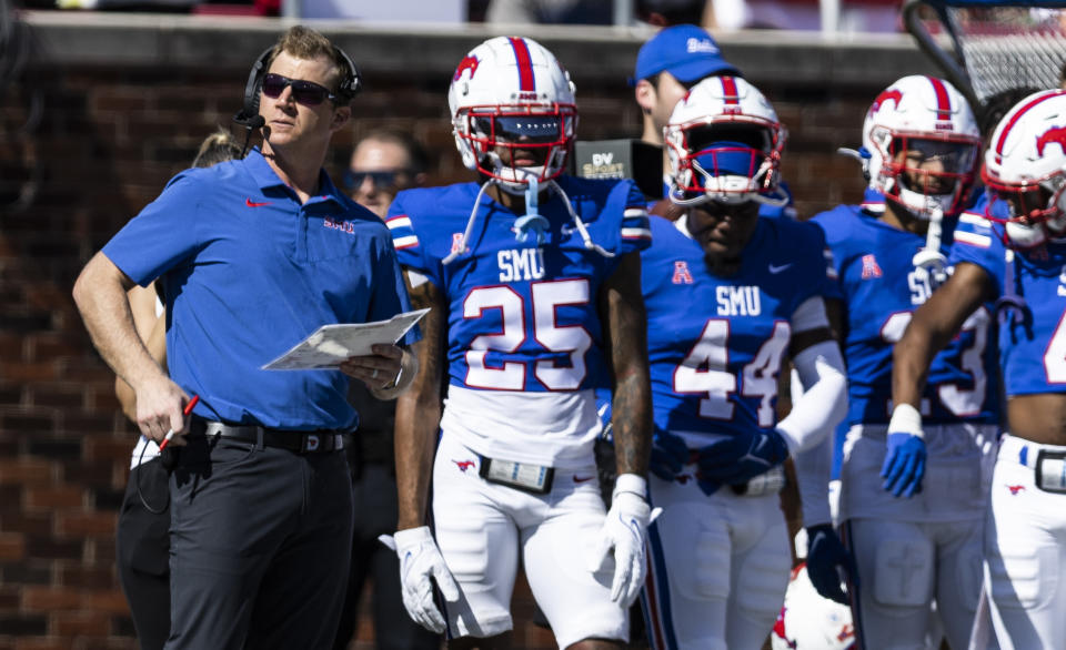 SMU head coach Rhett Lashlee looks on from the sidelines during the first half of an NCAA college football game against Cincinnati, Saturday, Oct. 22, 2022, in Dallas. (AP Photo/Brandon Wade)
