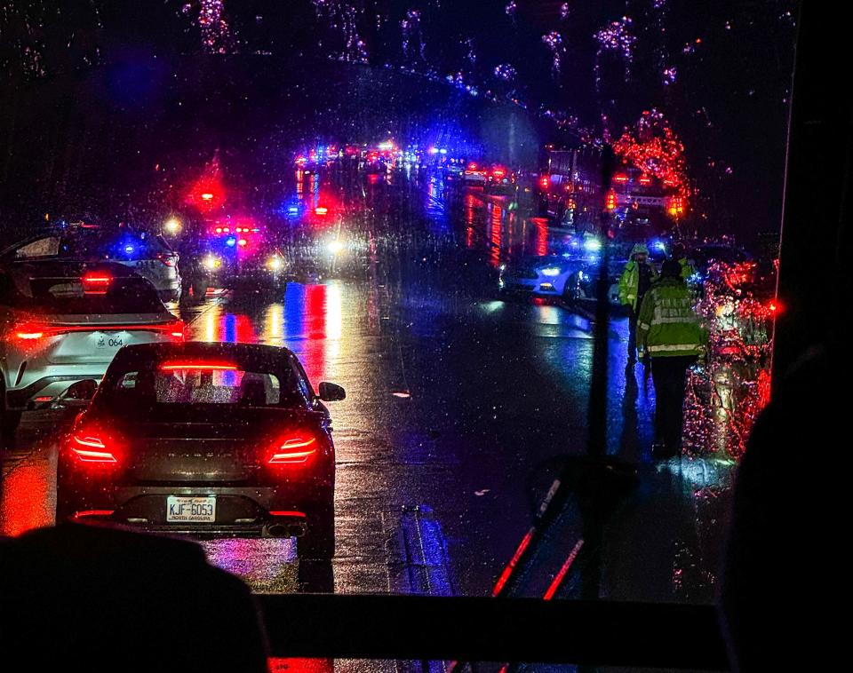 Traffic mixes with police, fire and rescue vehicles on Shelbyville Road after a pedestrian was struck by a tour bus near Valhalla on Friday, May 17, 2024
