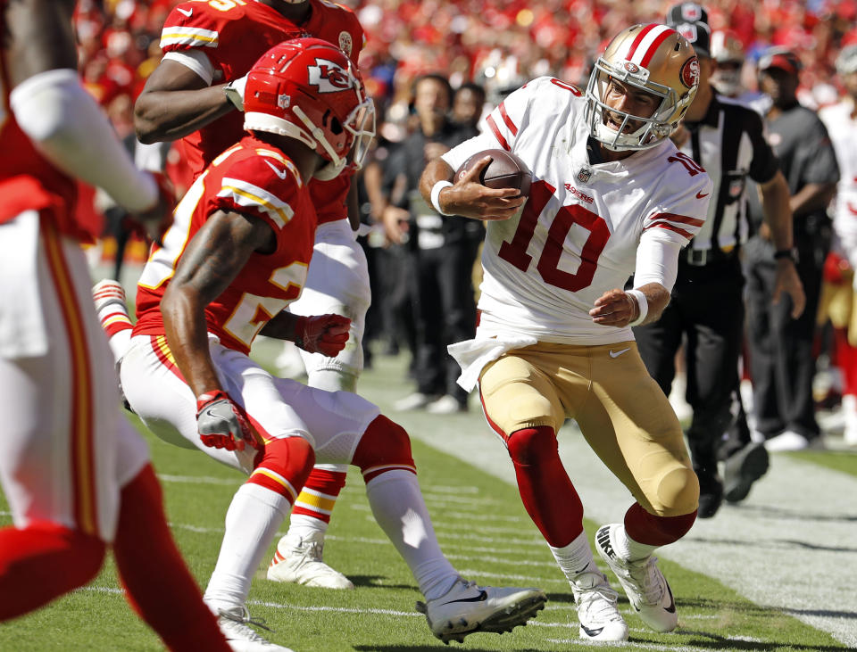 Kansas City Chiefs defensive back Steven Nelson (20) closes in to tackle San Francisco 49ers quarterback Jimmy Garoppolo (10), right, during the second half of an NFL football game in Kansas City, Mo., Sunday, Sept. 23, 2018. Garoppolo was injured on the play. (AP Photo/Charlie Riedel)