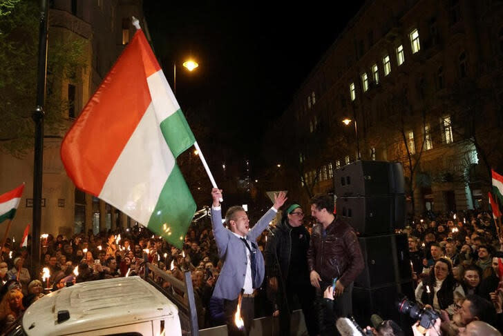 Peter Magyar, a lawyer and businessman formerly close to Hungary's ruling nationalist government, waves during a protest demanding the chief prosecutor Polt and Prime Minister Orban to resign, in Budapest