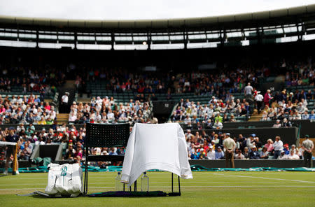 The gear of Serbia's Novak Djokovic is seen on Court 1 during his match against USA's Sam Querrey at the Wimbledon Tennis Championships in London, Britain July 2, 2016. REUTERS/Stefan Wermuth