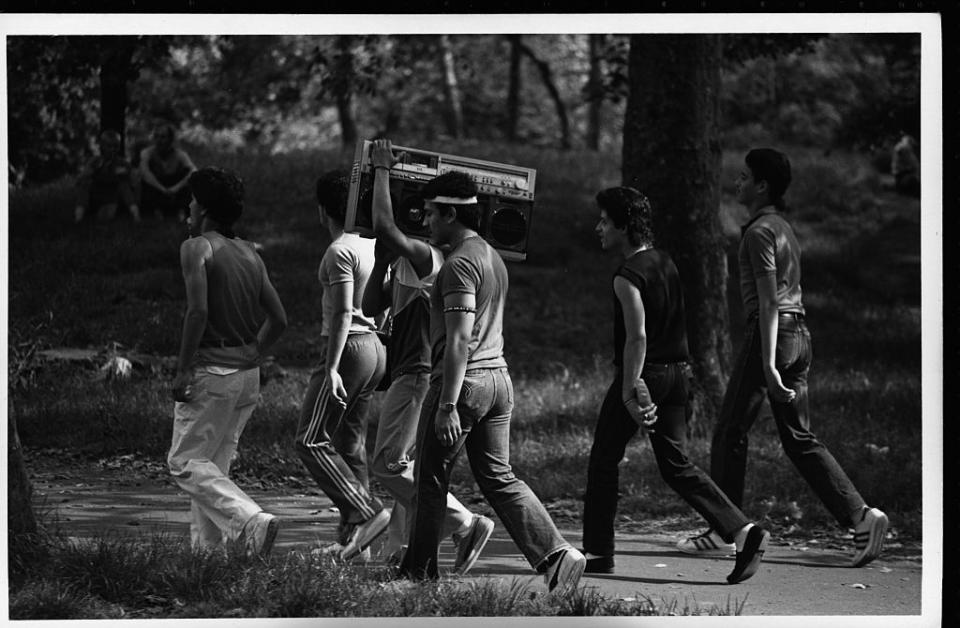 “Everyone had to have a big radio to carry around.” A group of young men carries a portable stereo through Central Park in Manhattan. (Credit: Karl Weatherly/Corbis via Getty Images)