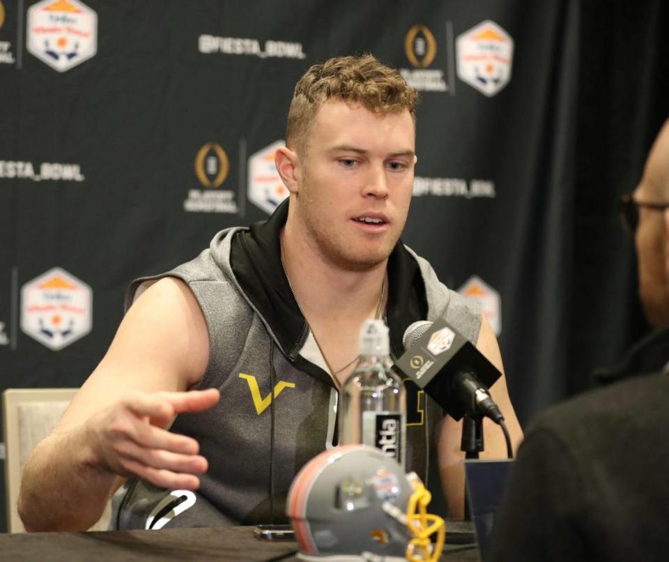 Michigan tight end Luke Schoonmaker talks with reporters before the Fiesta Bowl against TCU on Thursday, Dec. 29, 2022, in Scottsdale, Arizona.