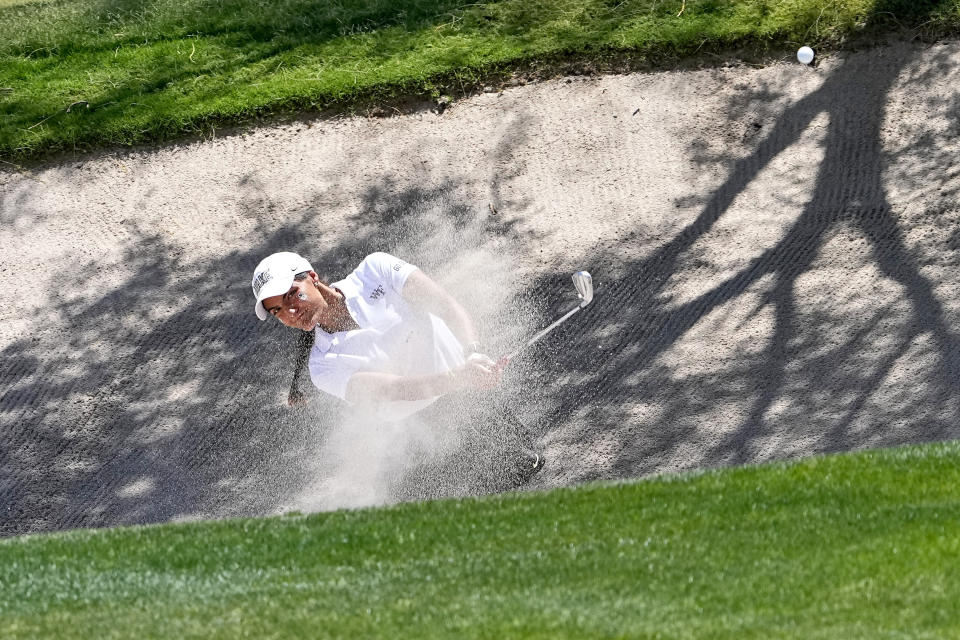 Wake Forest golfer Carolina Lopez-Chacarra hits from the bunker along the second fairway during the final round of the NCAA college women's golf championship at Grayhawk Golf Club, Monday, May 22, 2023, in Scottsdale, Ariz. (AP Photo/Matt York)