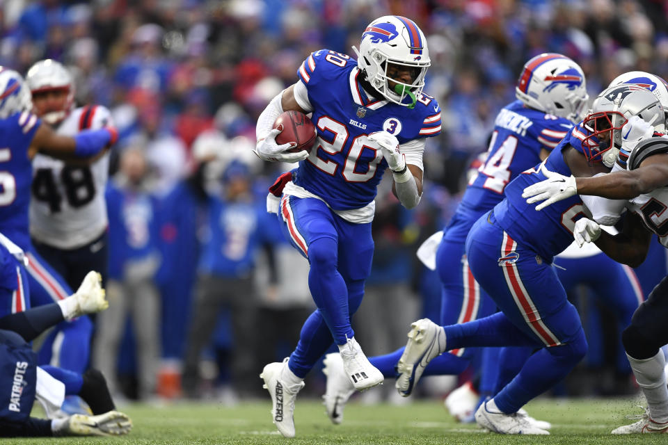 Buffalo Bills running back Nyheim Hines (20) runs in a touchdown on a kickoff return during the first half of an NFL football game against the New England Patriots, Sunday, Jan. 8, 2023, in Orchard Park. (AP Photo/Adrian Kraus)