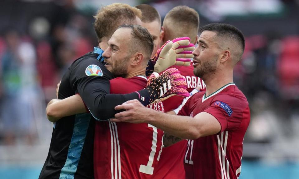 Peter Gulacsi, Endre Botka and Attila Szalai celebrate at the final whistle.