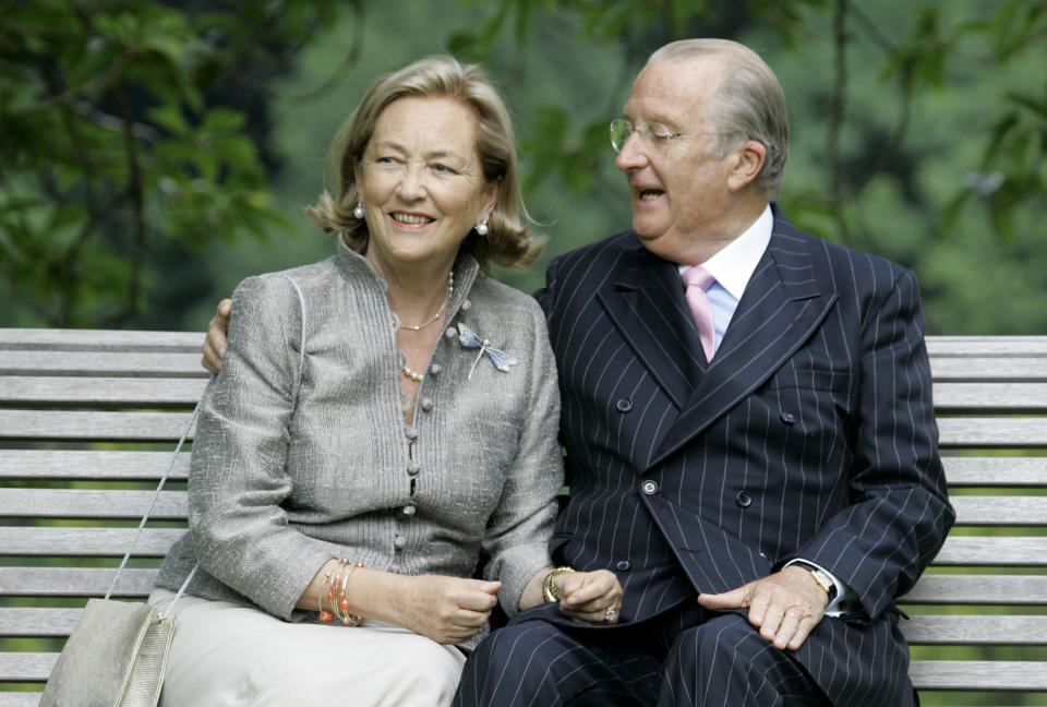 FILE - In this Tuesday, July 17, 2008 file photo, Belgium's Queen Paola and King Albert II pose for photographers at the Royal Palace in Laeken, Belgium. Belgium's royal scandal that has riveted the nation and damaged those involved reached a new milestone when former King Albert II reunited with the daughter he fathered out of wedlock over half a century ago. Capping a momentous few weeks, Albert II, and his wife Queen Paola met the former Delphine Boel, who is now recognized as Her Royal Highness Princess Delphine after a bitter two-decade paternity fight. (AP PhotoVirginia Mayo, File)