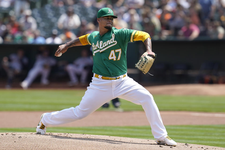 Oakland Athletics' Frankie Montas pitches against the San Francisco Giants during the first inning of a baseball game in Oakland, Calif., Sunday, Aug. 22, 2021. (AP Photo/Jeff Chiu)