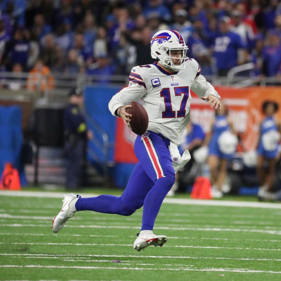 Bills quarterback Josh Allen runs the ball against the Lions during the first half of the Lions' 28-25 loss on Thursday, Nov. 24, 2022, at Ford Field.