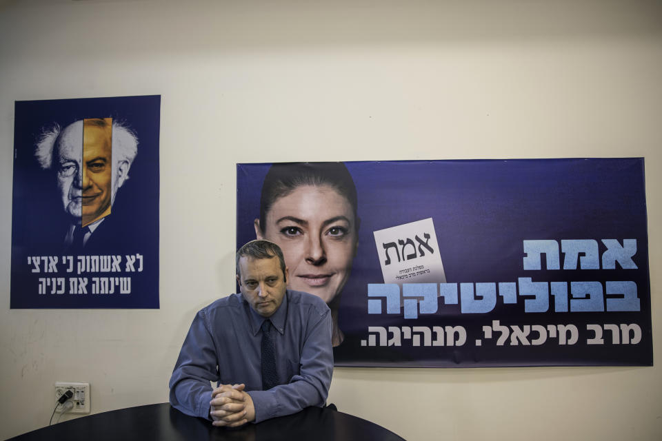 Gilad Kariv, leader of the Reform movement in Israel and a candidate for Knesset on the Labor party list, poses for a photo at the Party's headquarter In Tel Aviv, Israel, Wednesday, March 17, 2021. Gilad Kariv is poised to make history this month as the first Reform rabbi to win a seat in Israel's parliament. Holding a solid position on the slate of the center-left Labor party, Kariv's political ascent marks an important victory for religious pluralism and the millions of American Jews who belong to liberal streams of Judaism that have long been sidelined in Israel. (AP Photo/Tsafrir Abayov)