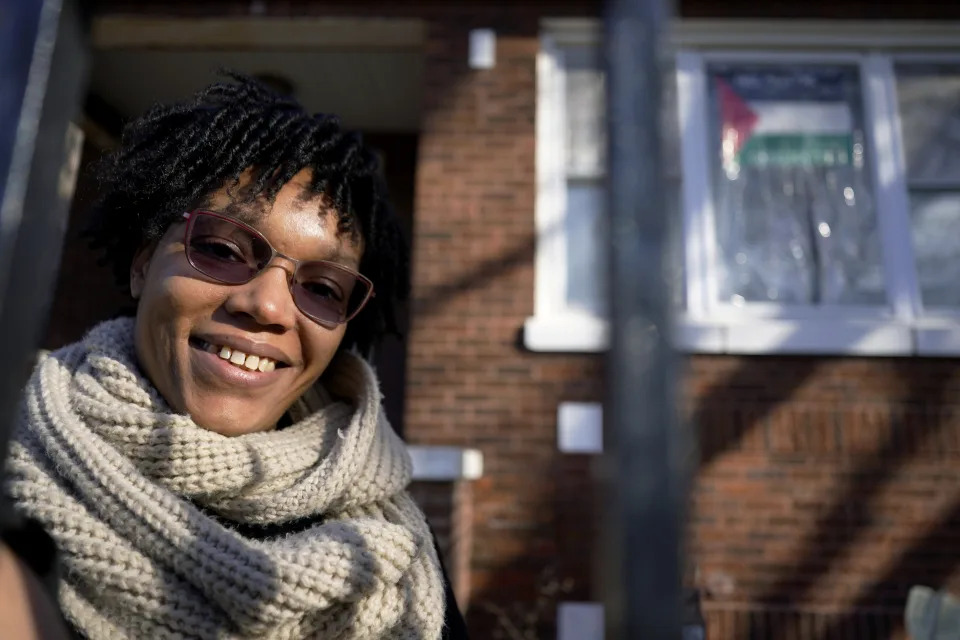 Cydney Wallace poses for a photo in Chicago, Tuesday, Nov. 28, 2023. Cydney Wallace is a Black Jewish woman who recently went on a trip to Israel and the West Bank through a trip called "Black Jerusalem" that was focused on exploring "the sacred geography of Jerusalem through a framework that privileges a Black American and an African lens." (AP Photo/Nam Y. Huh)