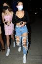 <p>Charli D'Amelio is out and about in L.A. on Tuesday, wearing a tie-dye mask and ripped jeans.</p>