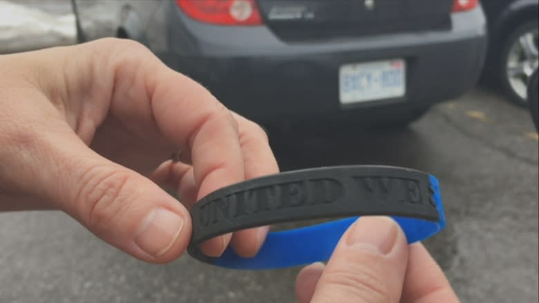 Ottawa police divided over wristband support of officer charged in Abdi death