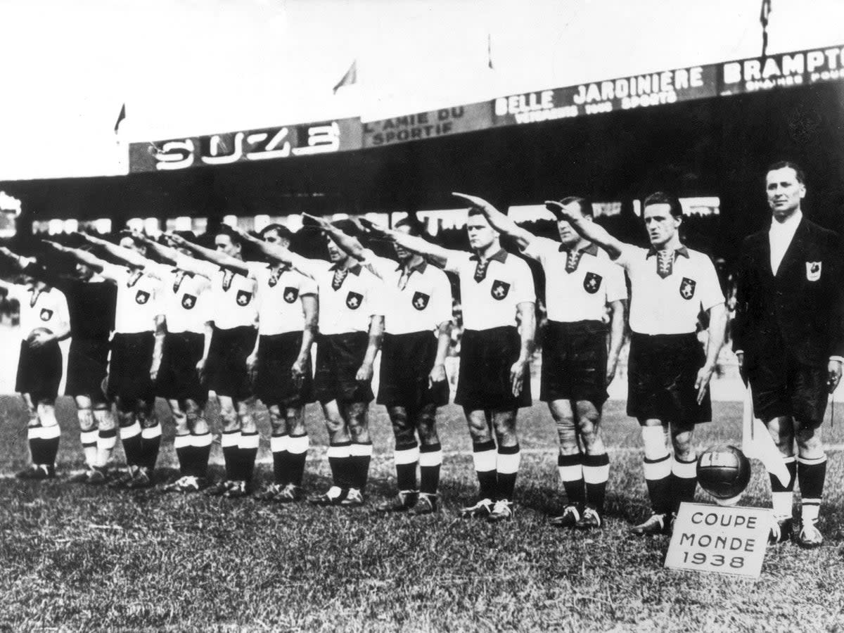 The Germany team perform a Nazi salute during the 1938 World Cup   (ullstein bild/Getty)