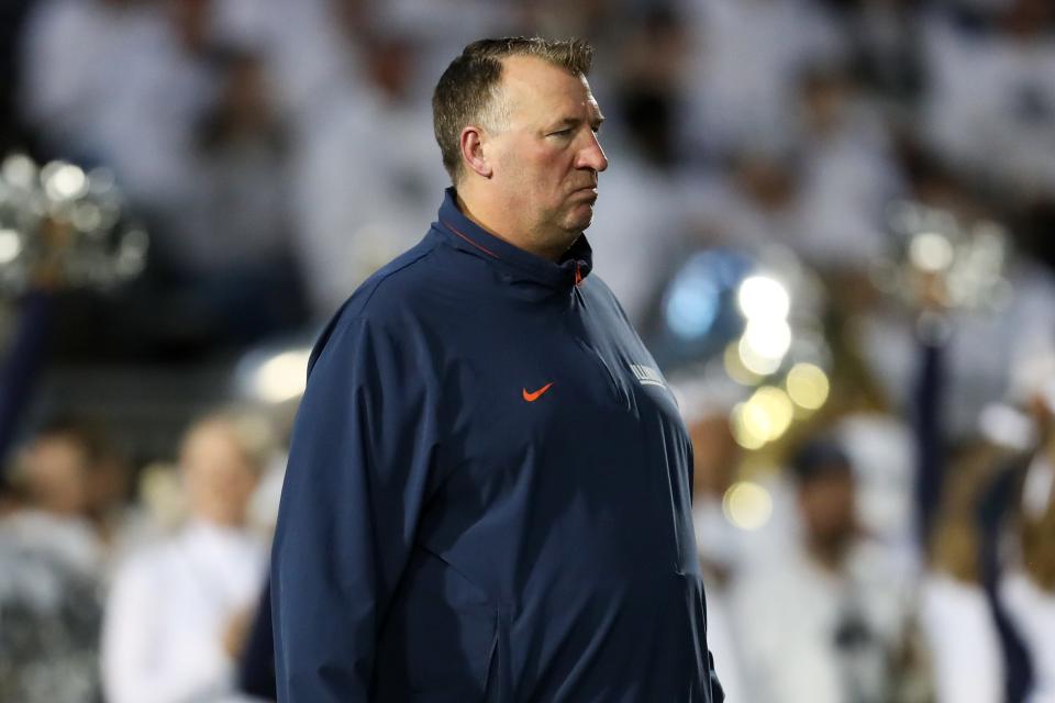 Sep 28, 2024; University Park, Pennsylvania, USA; Illinois Fighting Illini head coach Bret Bielema stands on the field during a warmup prior to a game against the Penn State Nittany Lions at Beaver Stadium.