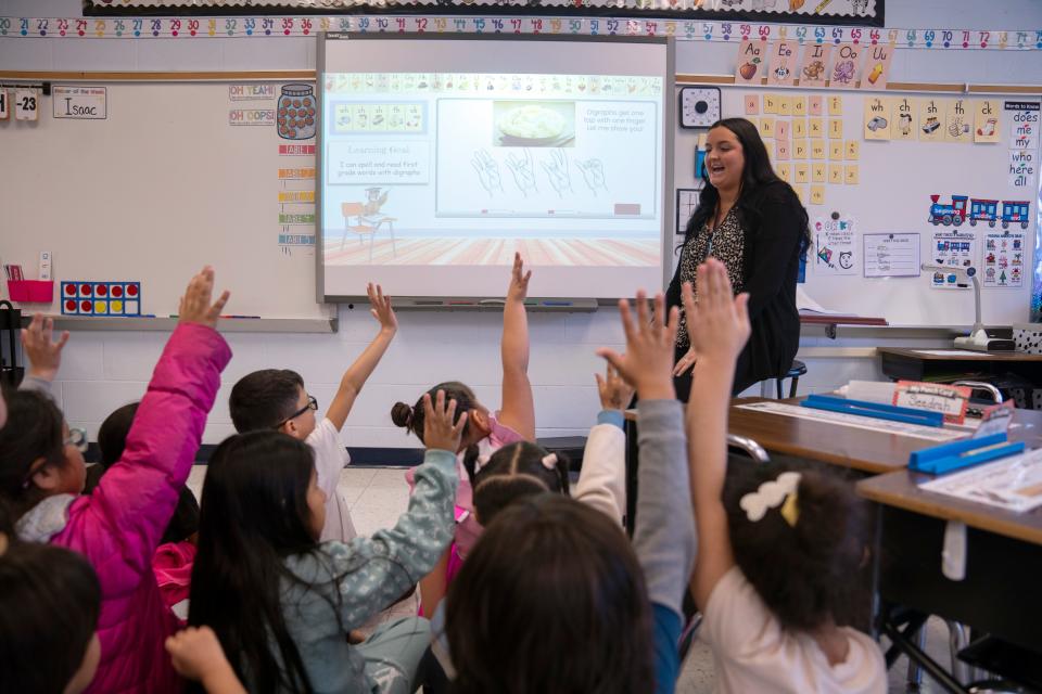 Keely Hassert teaches students in her first grade class phonemic awareness and foundational reading skills at Clifton School 17.