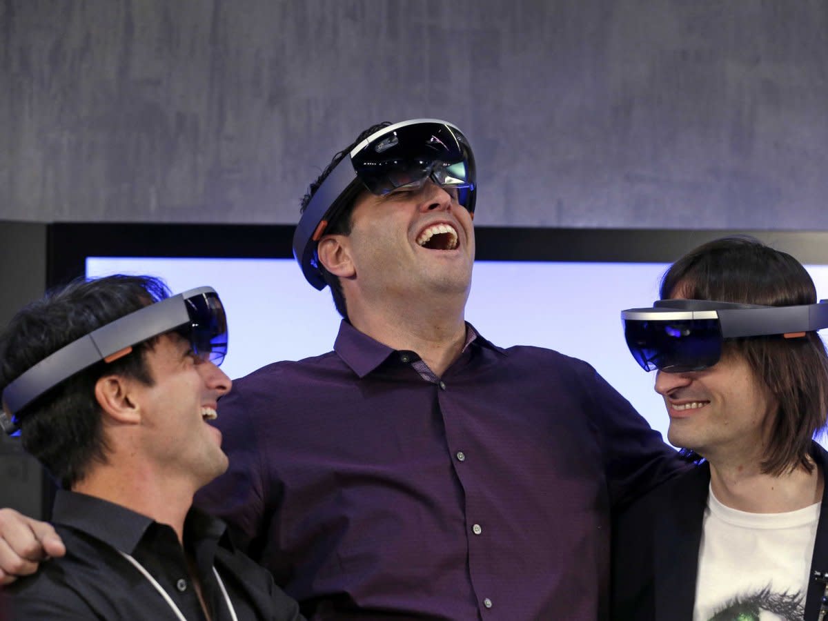 microsoft executives testing the hololens