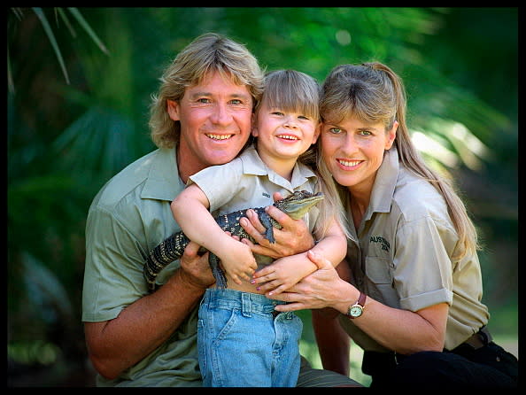 SUNSHINE COAST, AUSTRALIA – DECEMBER 14, 2002: (EUROPE AND AUSTRALASIA OUT) ‘Crocodile Hunter’ Steve Irwin with his wife Terri Irwin, and daughter Bindi Irwin, and a baby crocodile at Australia Zoo in Queensland. (Photo by Newspix/Getty Images)