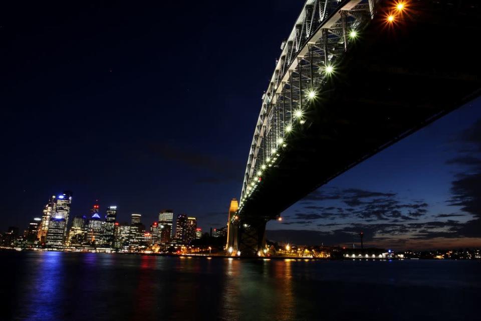 Sydney Harbour Bridge, Australia: The Sydney Harbour Bridge is seen before the lights are switched off for Earth Hour in Sydney, Australia.