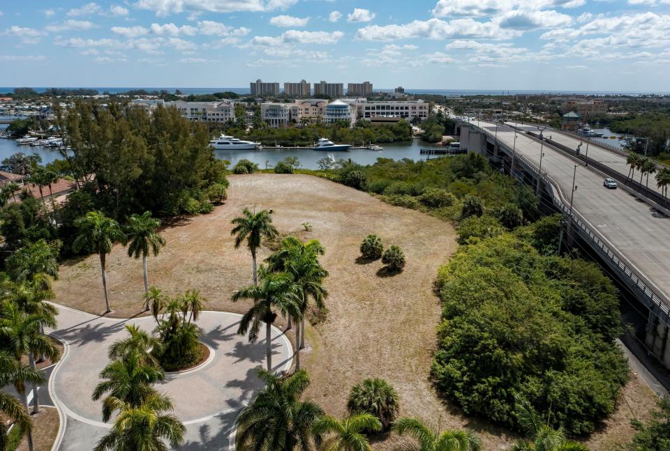 This parcel across the Intracoastal Waterway from Harbourside Place in Jupiter, seen here in April 2021, will become a restaurant and offices under a plan the Jupiter Town Council approved in the summer of 2023. Mark Emalfarb, the CEO of Dyadic International, has long owned the land, one of the last undeveloped parcels near Indiantown Road. He said he already has had interest from national restaurant chains.