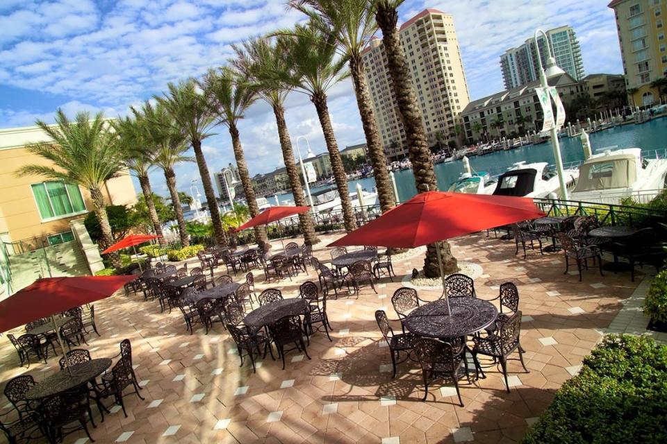 The Tampa Riverwalk borders the Hillsborough River for more than two miles, passing parks, the Florida Aquarium, and restaurants.