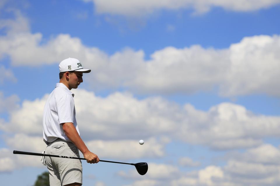 Fleming Island's Tyler Mawhinney juggles a ball with his driver on the fifth tee during the FHSAA Region 1-3A championship on Oct. 31 at St. Johns Golf Club in Elkton.