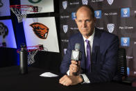 Washington head coach Mike Hopkins speaks during the Pac-12 NCAA college basketball media day, in San Francisco, Tuesday, Oct. 8, 2019. (AP Photo/D. Ross Cameron)