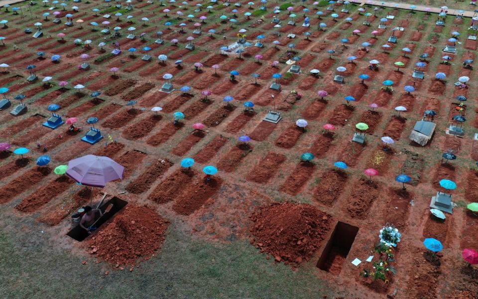 Graves being dug in Iquitos. More than 180,000 people in Peru have died because of the virus - Rodrigo Abd /AP