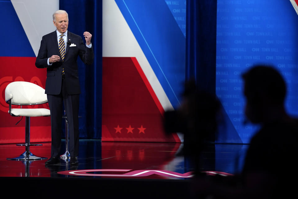 President Joe Biden talks during a televised town hall event at Pabst Theater, Tuesday, Feb. 16, 2021, in Milwaukee. (AP Photo/Evan Vucci)