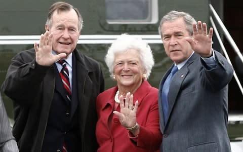 Barbara Bush waves alongside her son and husband in 2007 - Credit: Jason Reed/Reuters