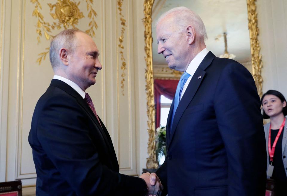 Russian President Vladimir Putin shakes hands with President Joe Biden during their meeting at the 'Villa la Grange' in Geneva, Switzerland on June 16, 2021.