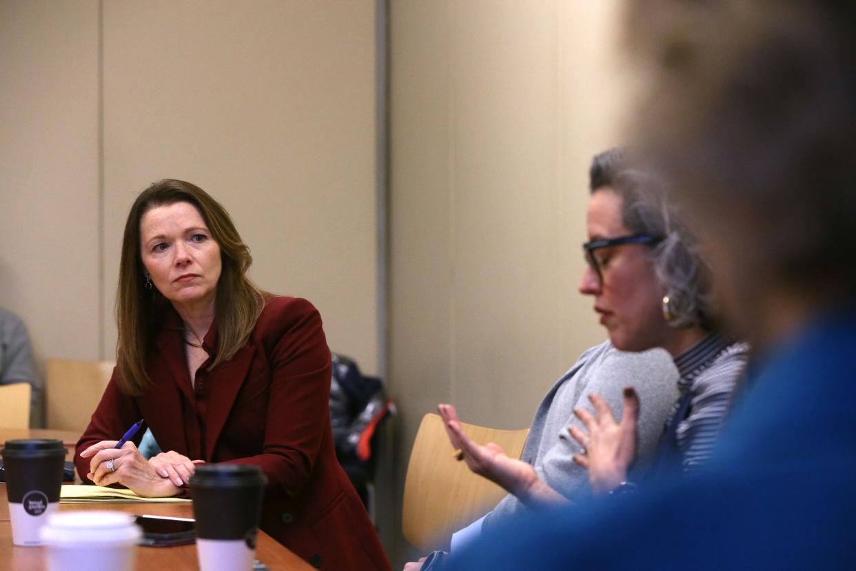 Christina Bohannan, left, democratic candidate for Iowa's 1st Congressional District, holds a roundtable discussion focusing on In Vitro Fertilization Tuesday, March 26, 2024 at the Iowa City Public Library.