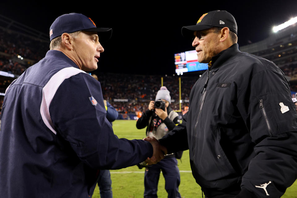 CHICAGO, ILLINOIS – OCTOBER 13: Head coach Matt Eberflus of the Chicago Bears and head coach Ron Rivera of the Washington Commanders shake hands after their game at Soldier Field on October 13, 2022 in Chicago, Illinois. (Photo by Michael Reaves/Getty Images)