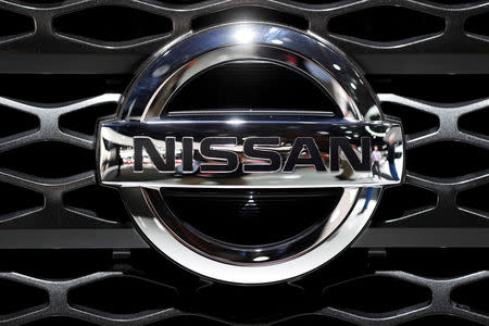 FILE PHOTO: A car with the Nissan logo badge is seen on display at the North American International Auto Show in Detroit, Michigan, U.S., January 16, 2018. REUTERS/Jonathan Ernst/File Photo