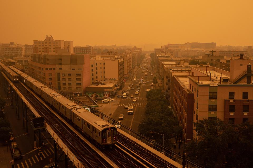 Smoky haze from wildfires in Canada blankets a neighborhood on June 7, 2023 in the Bronx borough of New York City.