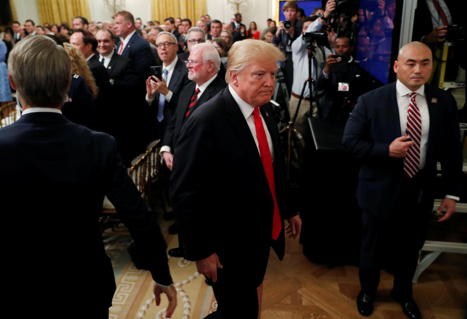 US President Donald Trump departs the East Room after speaking about pipe bomb packages. Source: Reuters