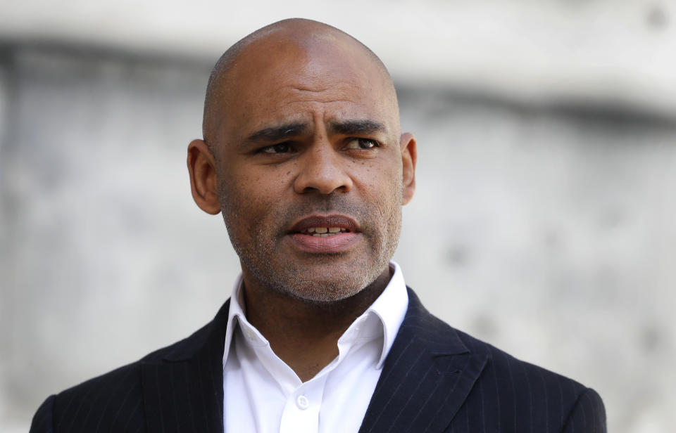 The Mayor of Bristol, Marvin Rees speaks to the Associated Press in Bristol, England, Monday, June 8, 2020, following the downing of a statue of Edward Colston on Sunday at a Black Lives Matter demo. The toppling of the statue was greeted with joyous scenes, recognition of the fact that he was a notorious slave trader — a badge of shame in what is one of Britain’s most liberal cities. (AP Photo/Kirsty Wigglesworth)