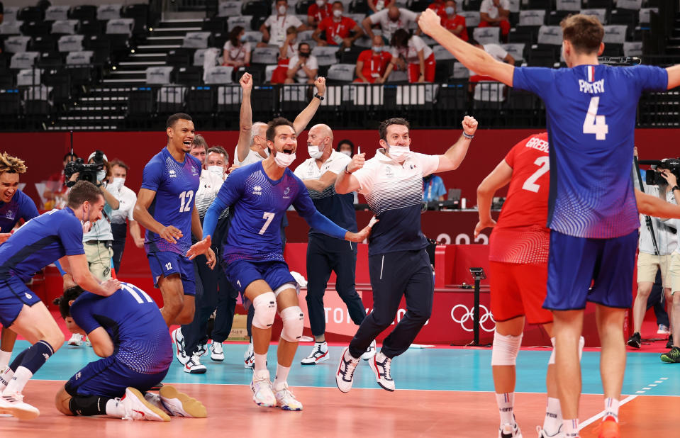 <p>TOKYO, JAPAN - AUGUST 03: Players and officials of Team France celebrate after defeating Team Poland during the Men's Quarterfinals volleyball on day eleven of the Tokyo 2020 Olympic Games at Ariake Arena on August 03, 2021 in Tokyo, Japan. (Photo by Toru Hanai/Getty Images)</p> 