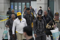 San Diego Padres player Yu Darvish, centre top, arrives at the Incheon International Airport In Incheon, South Korea, Friday, March 15, 2024. (AP Photo/Ahn Young-joon)