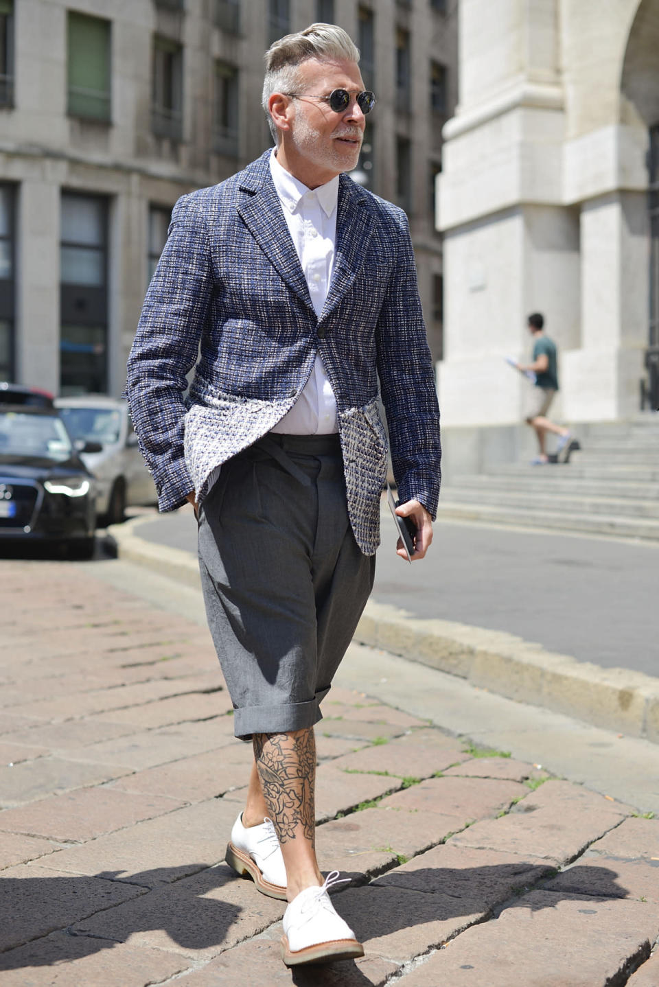 Nick Wooster in a blue and white blazer at Milan Fashion Week 2015. 