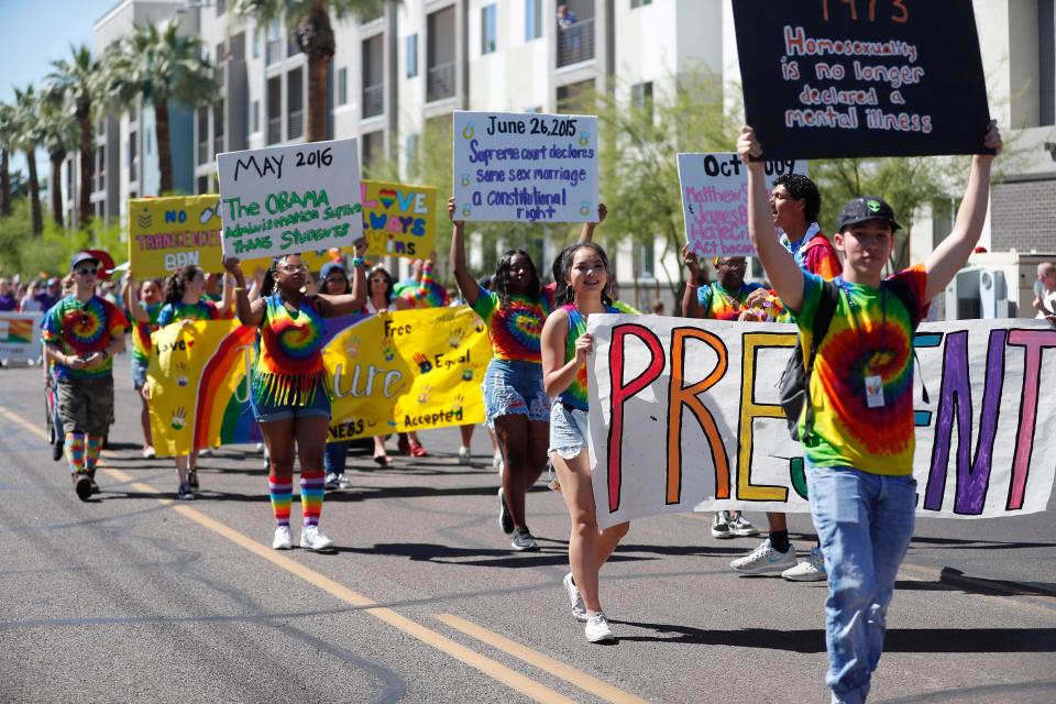 Participants with Betty H. Fairfax GSA march during the Phoenix Pride Parade on April 7, 2019.