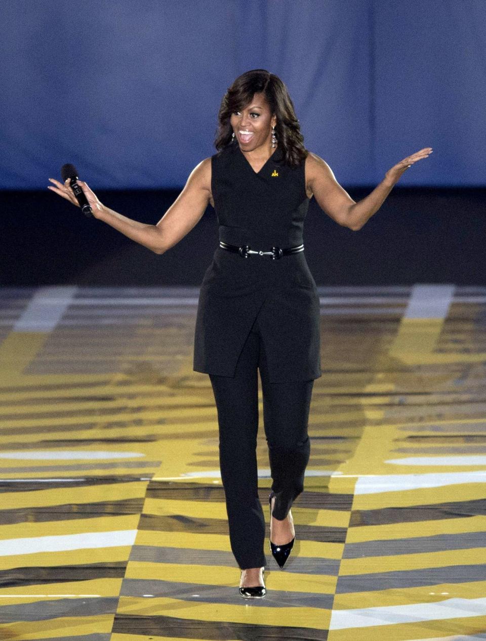 <a href="http://www.huffingtonpost.com/entry/michelle-obama-prince-harry-invictus-games_us_57307715e4b0bc9cb04741c7">Wearing BCBG</a> at the opening ceremony for the Invictus Games in Orlando, FL on May 8.&nbsp;