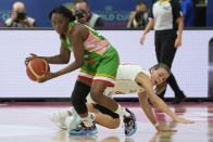 Mali's Djeneba N'Diaye, left, steals the ball from Serbia's Nevena Jovanovic during their game at the women's Basketball World Cup in Sydney, Australia, Monday, Sept. 26, 2022. (AP Photo/Rick Rycroft)