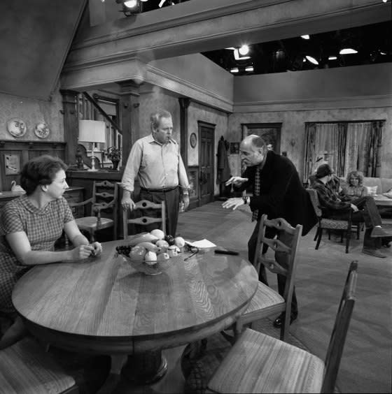 Jean Stapleton and Carroll O'Connor speaking to <em>All in the Family</em> show creator Norman Lear, Dec. 22, 1970. <span class="copyright">CBS/Getty Images</span>