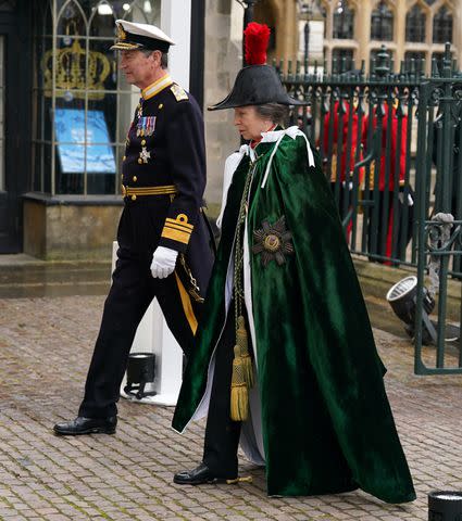 <p>Andrew Milligan - WPA Pool/Getty</p> Princess Anne and Vice Admiral Sir Tim Laurence arrive at Westminster Abbey in for the coronation on May 6, 2023.