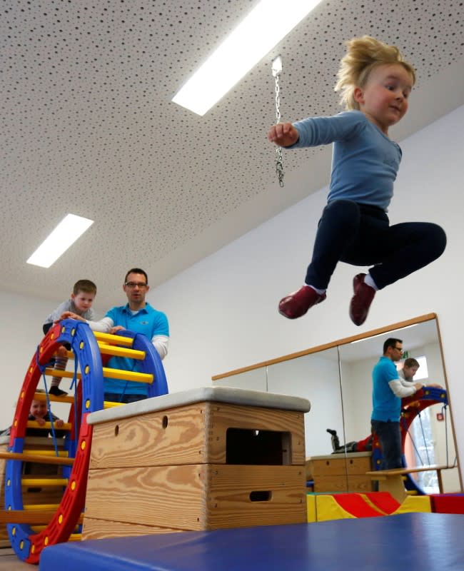 FILE PHOTO: Children enjoy their gymnastics class at their Kindergarten in Hanau