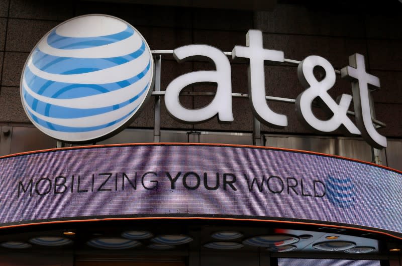 Signage for an AT&T store is seen in New York October 29, 2014. REUTERS/Shannon Stapleton/File Photo