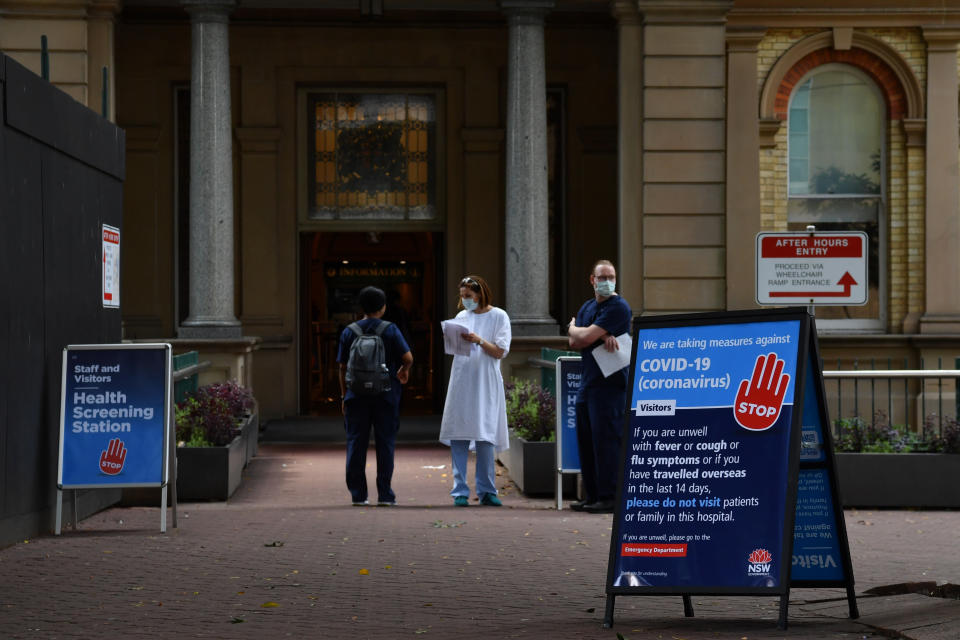 Staff wearing face masks outside the Royal Prince Alfred Hospital (RPA) in Camperdown, Sydney. Source: AAP