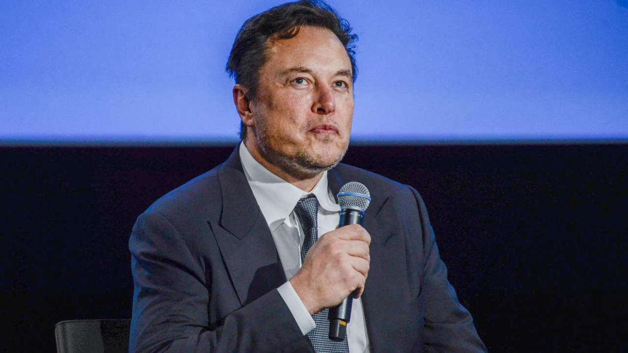 Tesla CEO Elon Musk looks up as he addresses guests at the Offshore Northern Seas 2022 (ONS) meeting in Stavanger, Norway on August 29, 2022. - The meeting, held in Stavanger from August 29 to September 1, 2022, presents the latest developments in Norway and internationally related to the energy, oil and gas sector. (Photo by Carina Johansen / NTB / AFP) / Norway OUT